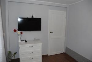 TV a/nebo společenská místnost v ubytování Grey House