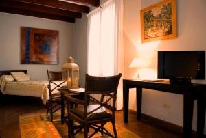 TV a/nebo společenská místnost v ubytování Casa Tierra Negra