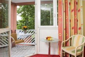 Rõdu või terrass majutusasutuses Johannesbad Hotel Phönix