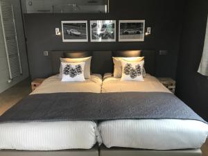 Letto o letti in una camera di "Un matin au jardin"
