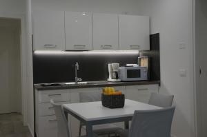 Kuchyňa alebo kuchynka v ubytovaní Casa vacanze da Alcide
