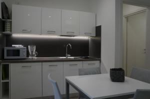 Kuchyňa alebo kuchynka v ubytovaní Casa vacanze da Alcide