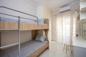 Posteľ alebo postele v izbe v ubytovaní Flora's Place