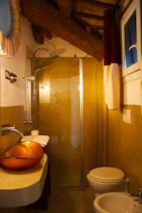 a bathroom with a shower with a toilet and a sink at Pan & Cioccolato in Bellaria-Igea Marina