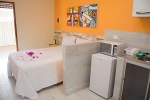 Køkken eller tekøkken på Porto de Galinhas Yes Maria