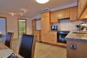 Kuchyň nebo kuchyňský kout v ubytování Ferienwohnung Steinmattstrasse