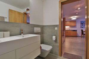 Koupelna v ubytování Ferienwohnung Steinmattstrasse + 37 fotografií
