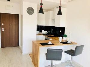 Kuchyňa alebo kuchynka v ubytovaní Living Point Residence