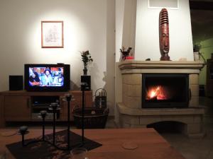 TV a/nebo společenská místnost v ubytování Vakantie huis Dum Oenter