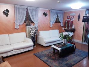 Posezení v ubytování Hotel Arcella