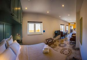 Postel nebo postele na pokoji v ubytování Casa Azzopardi Suites