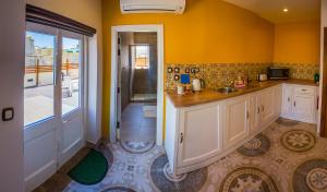 Kuchyň nebo kuchyňský kout v ubytování Casa Azzopardi Suites