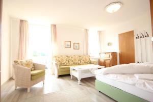 Postel nebo postele na pokoji v ubytování Hotel Villa Sisi