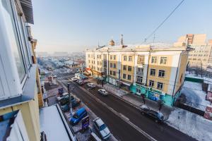 an aerial view of a city street with buildings at Dekabrist Apartment at leningradskaya 24 in Chita