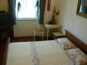 Postel nebo postele na pokoji v ubytování Guest House Marijana