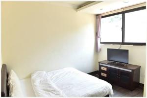 TV a/nebo společenská místnost v ubytování Lian-Yuan Homestay No. 1