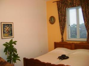Postel nebo postele na pokoji v ubytování Guest House Marijana