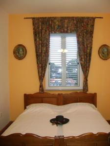 Postel nebo postele na pokoji v ubytování Guest House Marijana