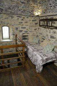Ένα ή περισσότερα κρεβάτια σε δωμάτιο στο Casa Francesca Torre Saracena