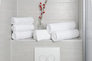 Ein Bett oder Betten in einem Zimmer der Unterkunft Aparthotel Lenau