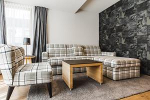 Posezení v ubytování Hotel Vier Jahreszeiten