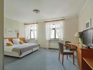 Katil atau katil-katil dalam bilik di Hotel Zamojski
