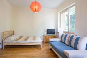 Postel nebo postele na pokoji v ubytování NavyBlue Apartments