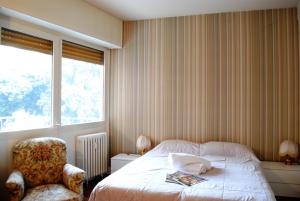 Posteľ alebo postele v izbe v ubytovaní Dreaming Piazza Bra Rooms