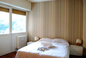 Posteľ alebo postele v izbe v ubytovaní Dreaming Piazza Bra Rooms
