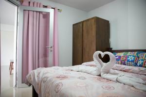 Katil atau katil-katil dalam bilik di Grandbeach 2 Condominium by malai +22 gambar