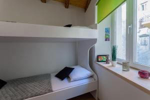 Posteľ alebo postele v izbe v ubytovaní Guest House Blue