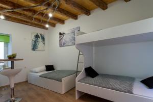 Posteľ alebo postele v izbe v ubytovaní Guest House Blue