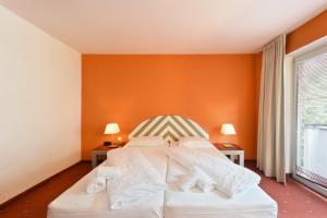 
Ein Bett oder Betten in einem Zimmer der Unterkunft Hotel Neutor Express
