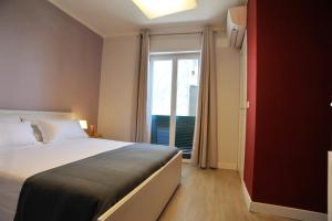 Postel nebo postele na pokoji v ubytování aquarium rooms