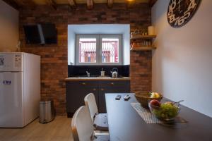 Kuchyňa alebo kuchynka v ubytovaní Guest House Blue
