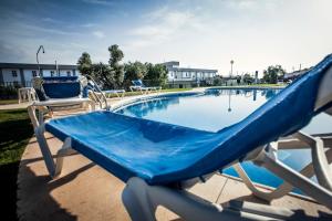 Bazén v ubytování Gran Hotel Ciudad Del Sur nebo v jeho okolí