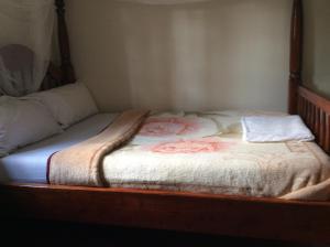 Letto o letti in una camera di Skyway Hotel