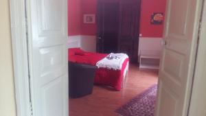 Un pat sau paturi într-o cameră la B&B La Soffitta Del Barone