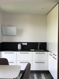 Kuchyň nebo kuchyňský kout v ubytování Utriai Guest Place