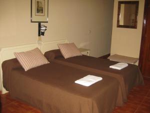 Posteľ alebo postele v izbe v ubytovaní Hotel Molino De Saydo