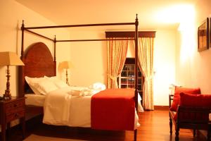 Ένα ή περισσότερα κρεβάτια σε δωμάτιο στο Hotel Convento Nossa Senhora do Carmo