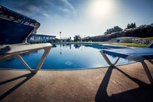 Bazén v ubytování Gran Hotel Ciudad Del Sur nebo v jeho okolí