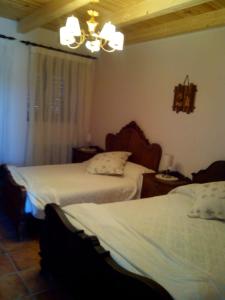 Łóżko lub łóżka w pokoju w obiekcie Hansel y Gretel