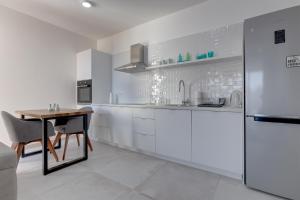 Η κουζίνα ή μικρή κουζίνα στο Villa Zen Port