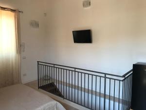 Voodi või voodid majutusasutuse Decadracma rooms toas