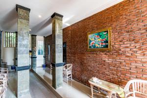 Posezení v ubytování Dicky Guest House Batu Bolong