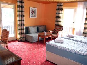 A bed or beds in a room at Hotel Neustädter Hof