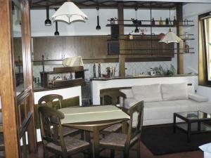 a living room with a couch and a table at Apartmaji Mak in Jesenice
