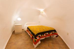 A bed or beds in a room at Montes Claros 26