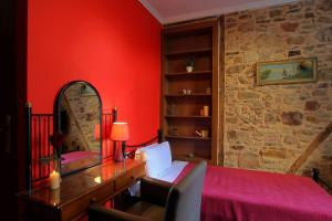 A bed or beds in a room at Ionia rooms